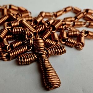 Elegant Copper Coil Cross Necklace
